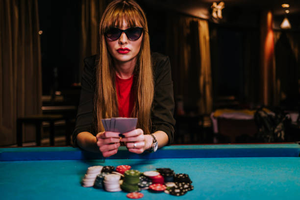 Live dealer at blackjack table with multi-camera studio setup
